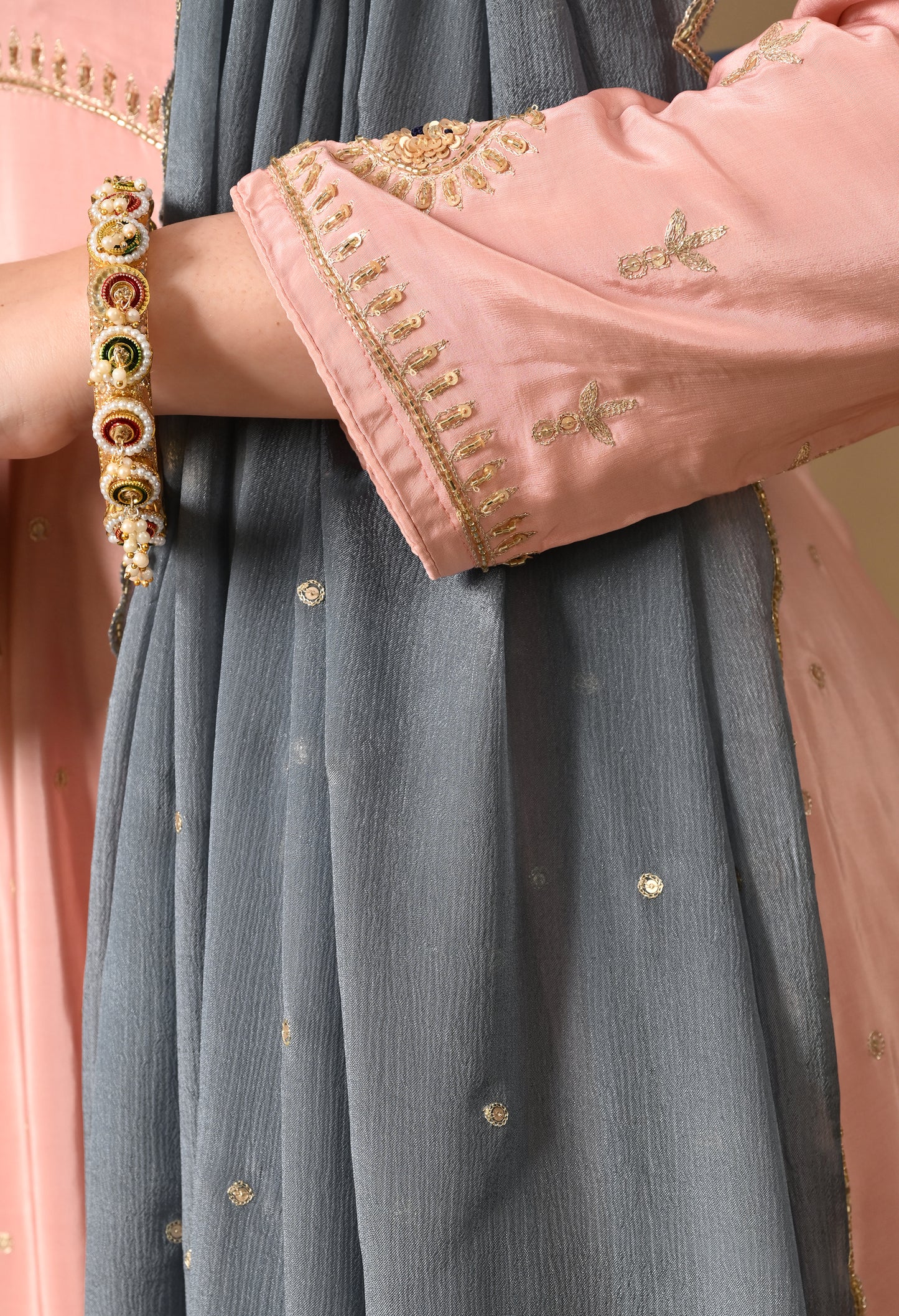 Mesmerising Peach Pink Anarkali Set with Intricate Zardozi Work
