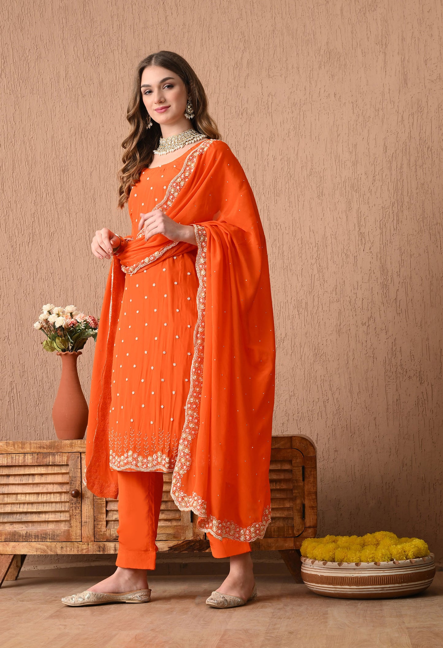 Vibrant Orange Kurta Set with Beautiful Zardozi, Pearl, and Cutdana Work