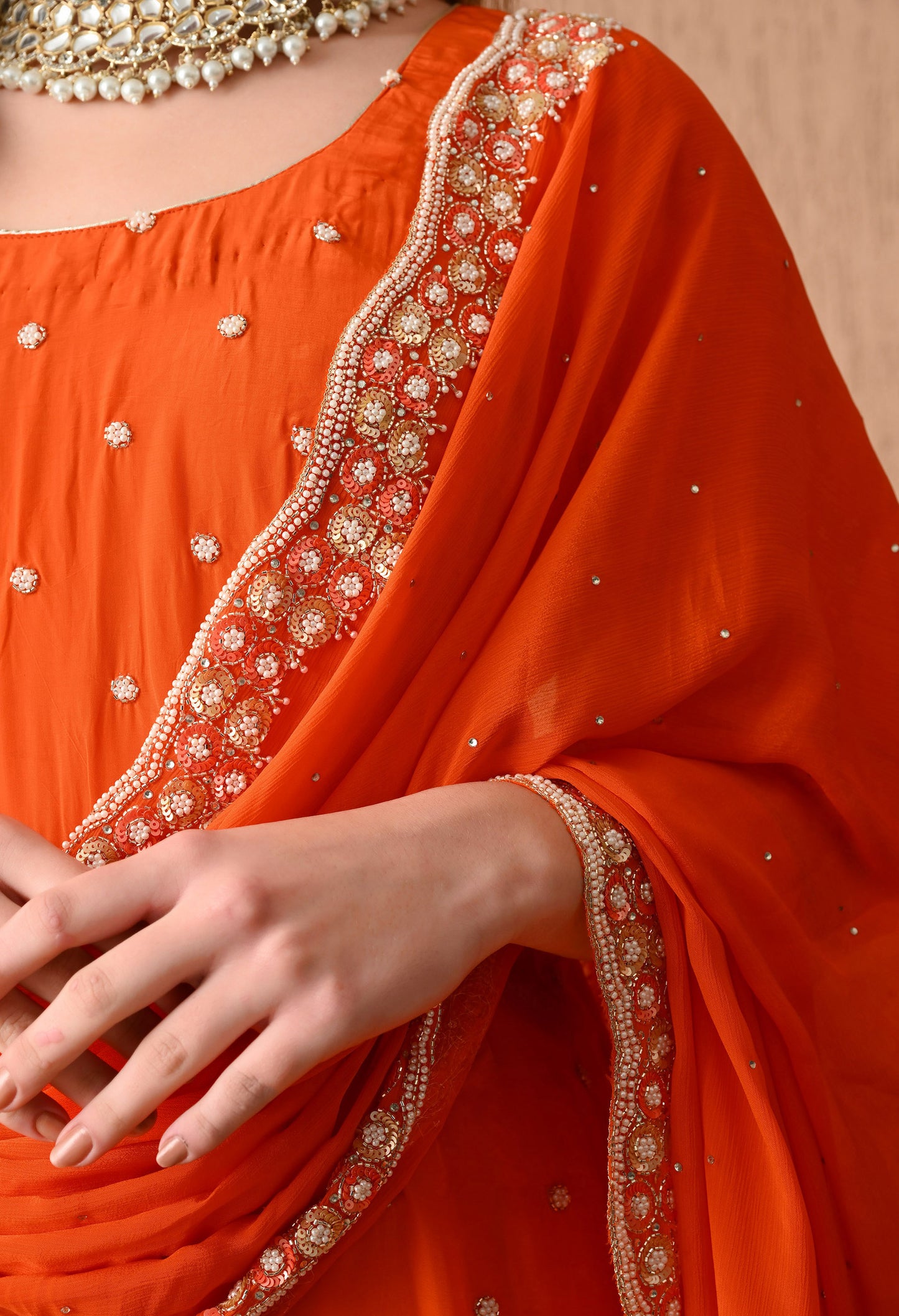 Vibrant Orange Kurta Set with Beautiful Zardozi, Pearl, and Cutdana Work