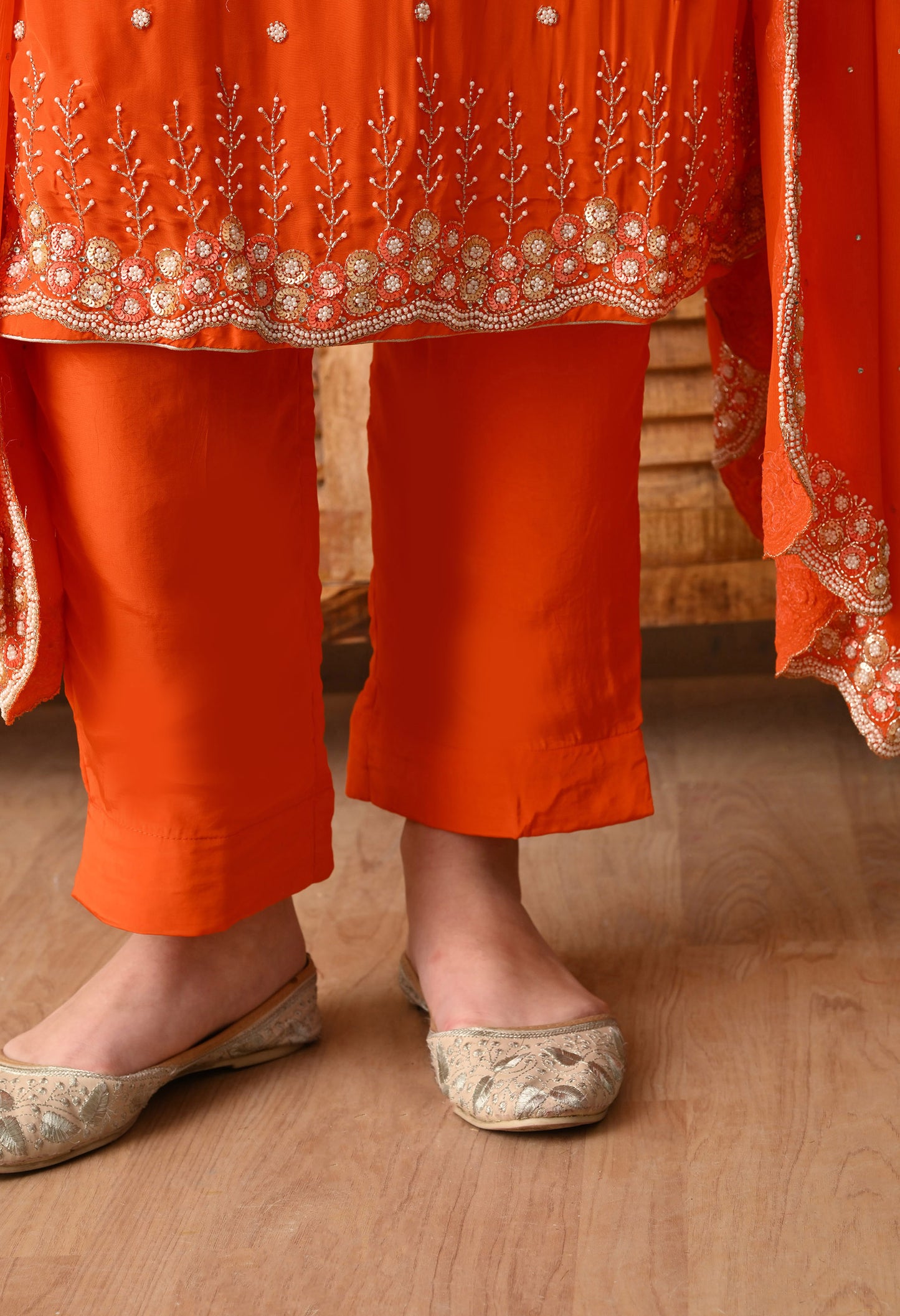 Vibrant Orange Kurta Set with Beautiful Zardozi, Pearl, and Cutdana Work