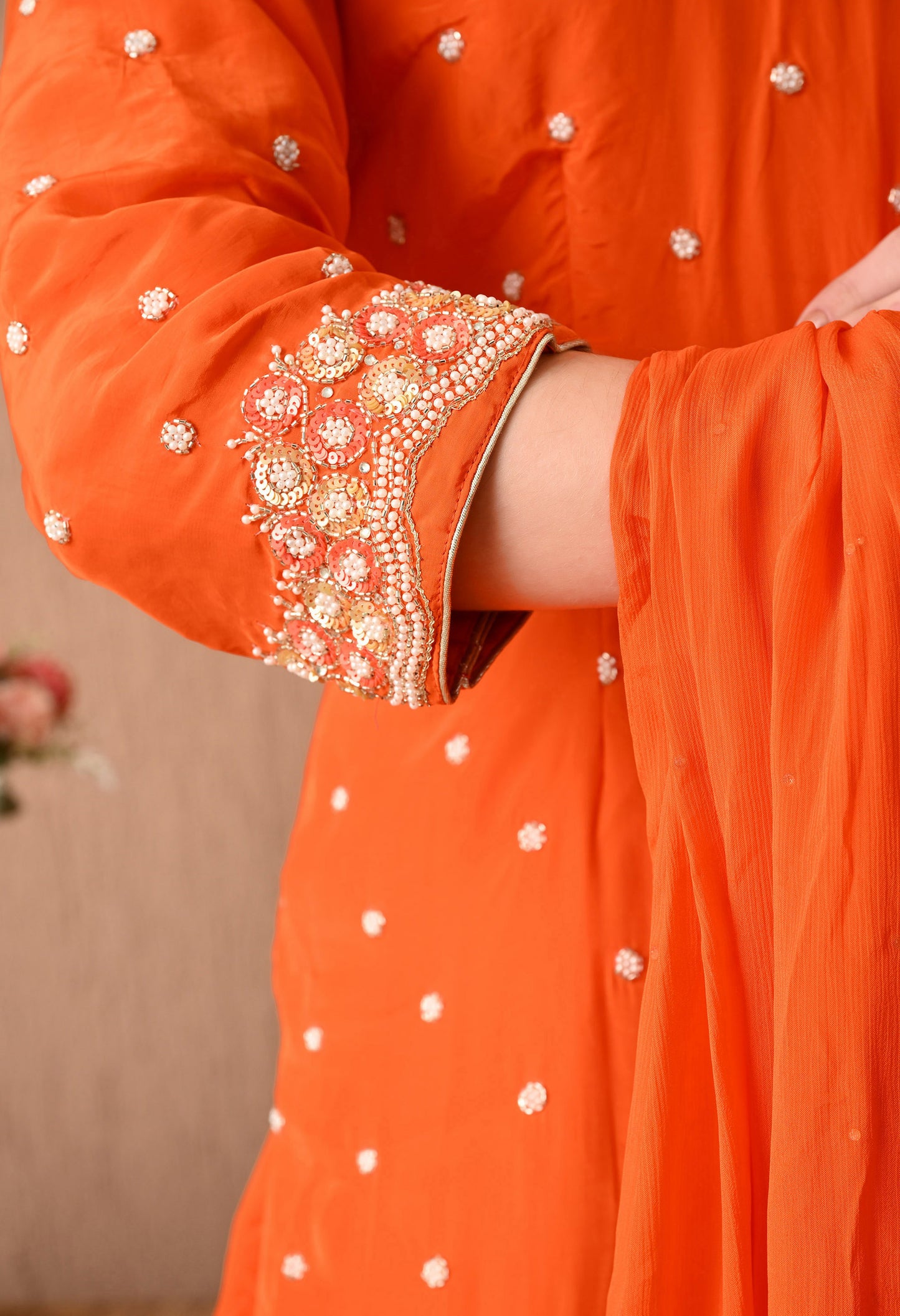 Vibrant Orange Kurta Set with Beautiful Zardozi, Pearl, and Cutdana Work