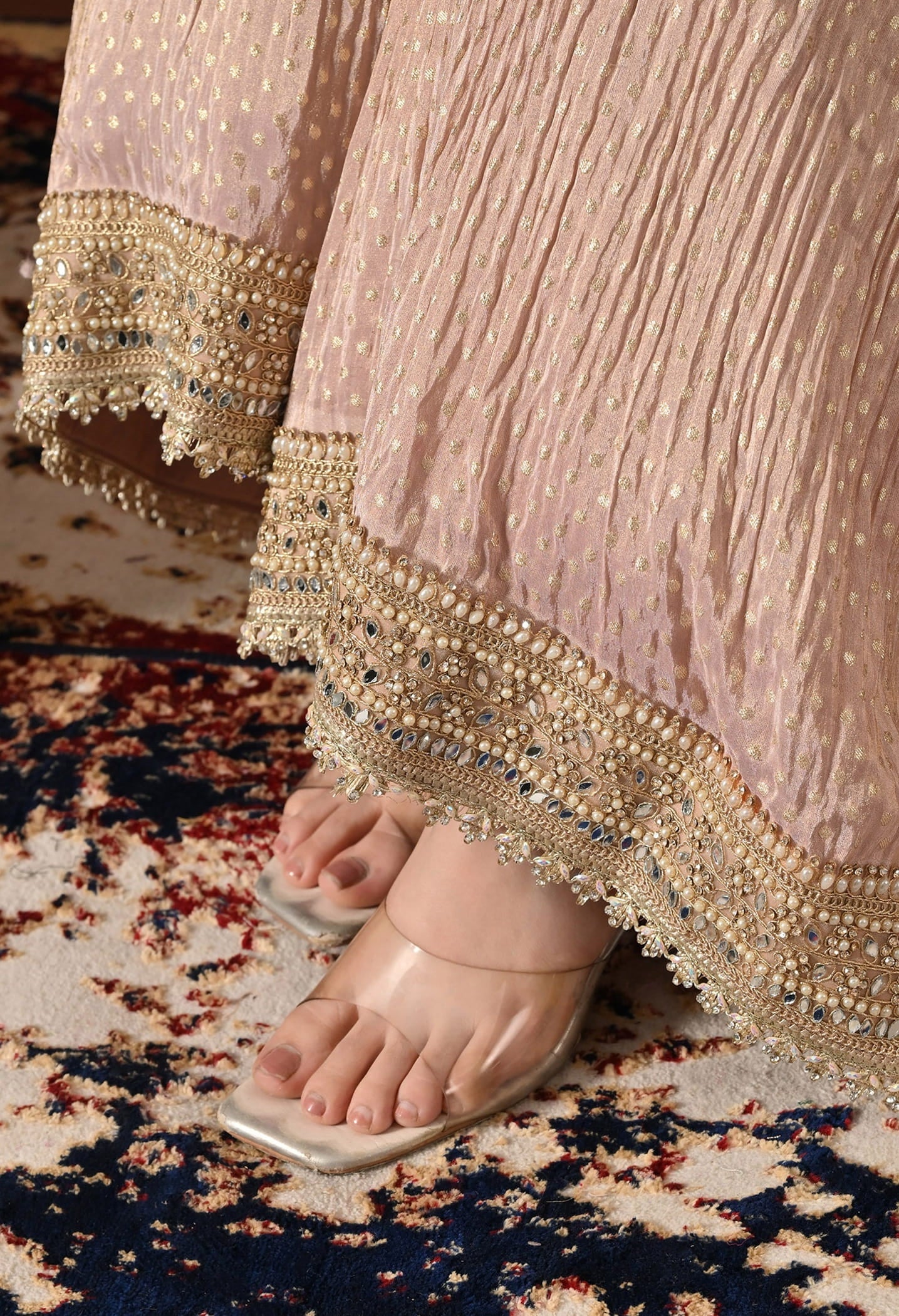 Golden Peach Gharara Set with Dabka, Zardozi, Pearl, and Sequin work.