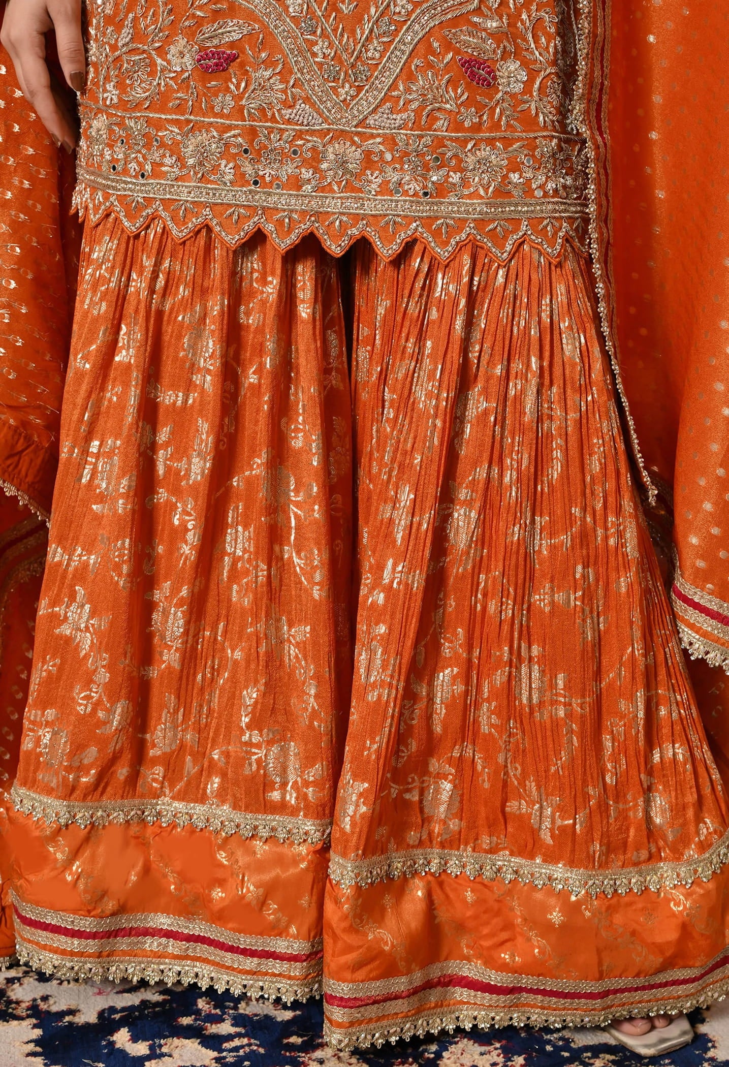 Orange Gharara Set with Zardozi, Dabka, Sequin, Mirror, and Thread Embroidery.