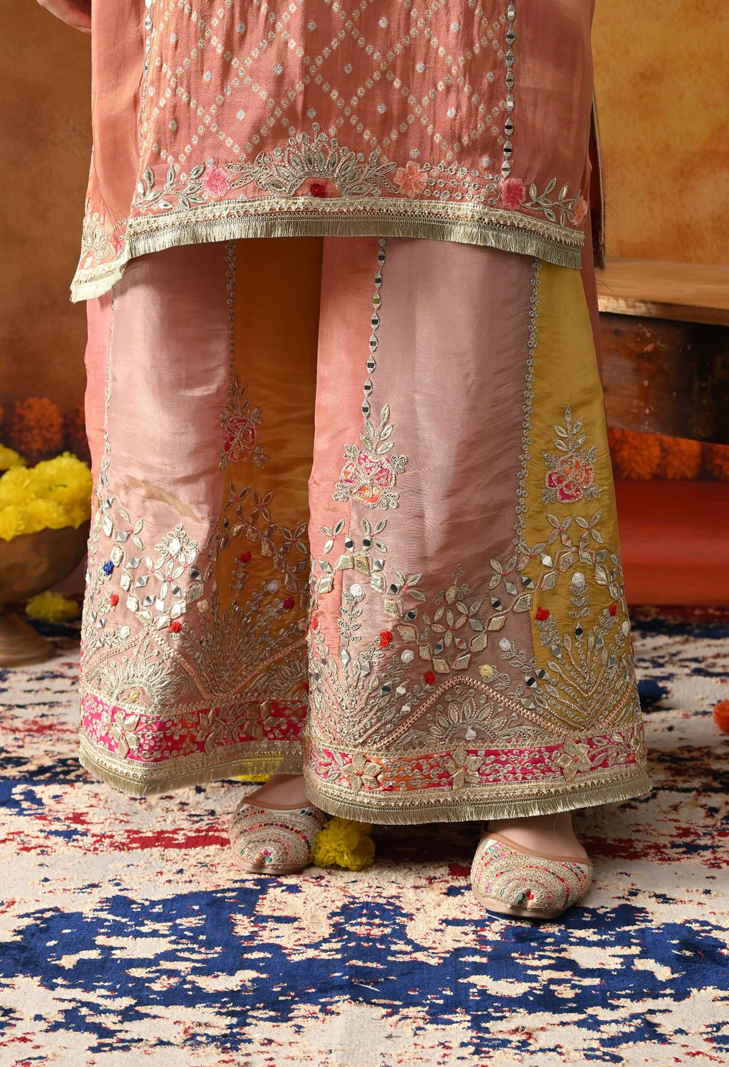 Creamy Peach Tissue Crepe Sharara Set with intricate gotta, zardozi, applique, and thread work, paired with a multicolour sharara and matching dupatta