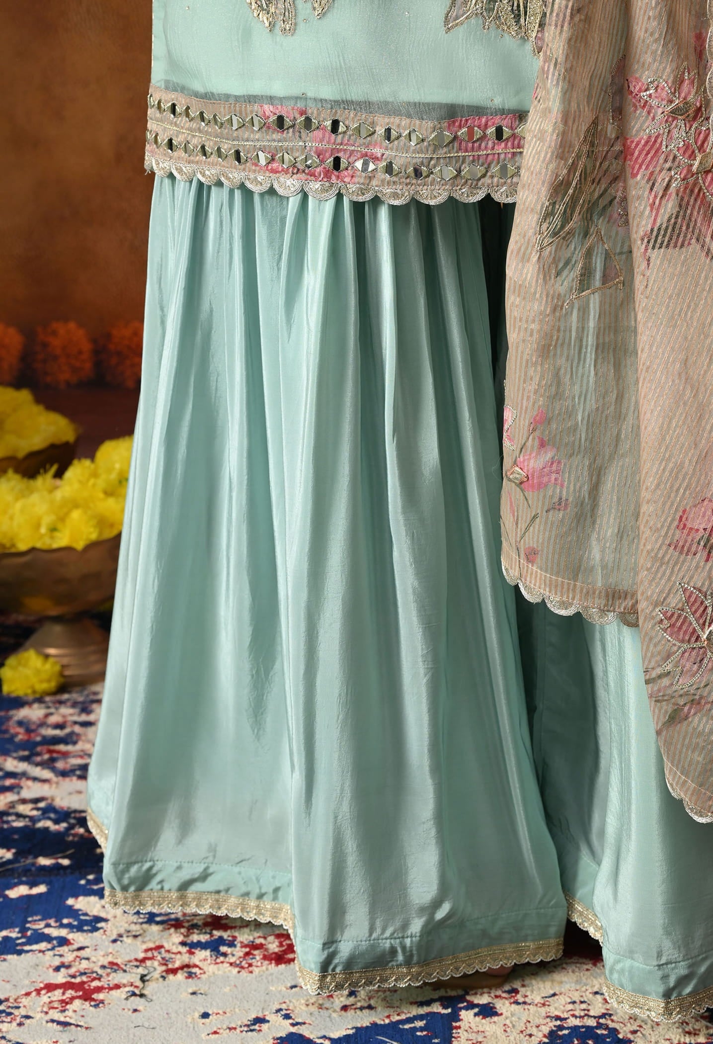 Pistachio Green Gharara Set in crust tissue with intricate gotta, applique, and zardozi work, paired with a contrasting brown dupatta