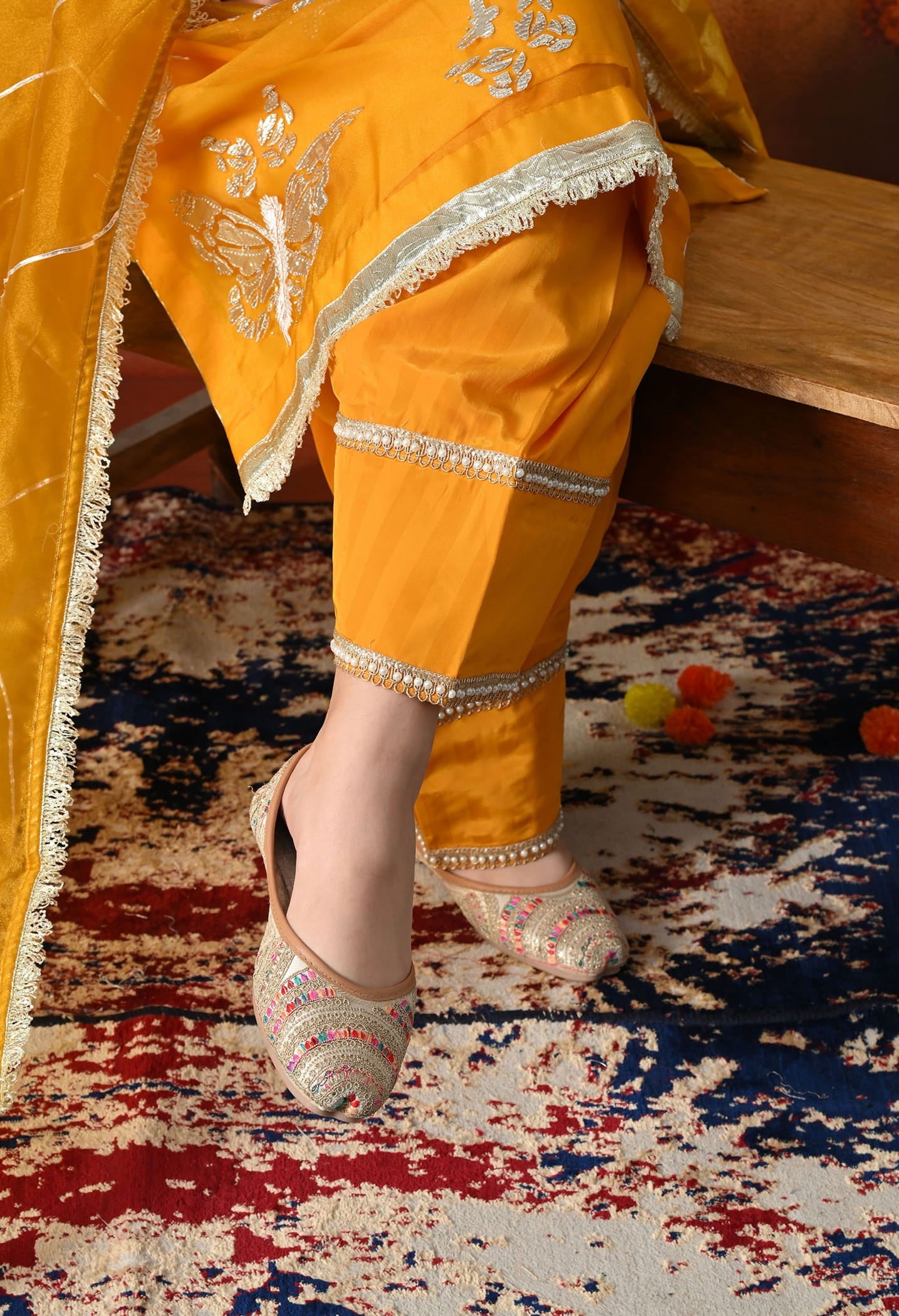 Orangeish Yellow Tissue Organza Kurta Set with intricate gotta, zardozi, and crystal work, paired with a farshi salwar