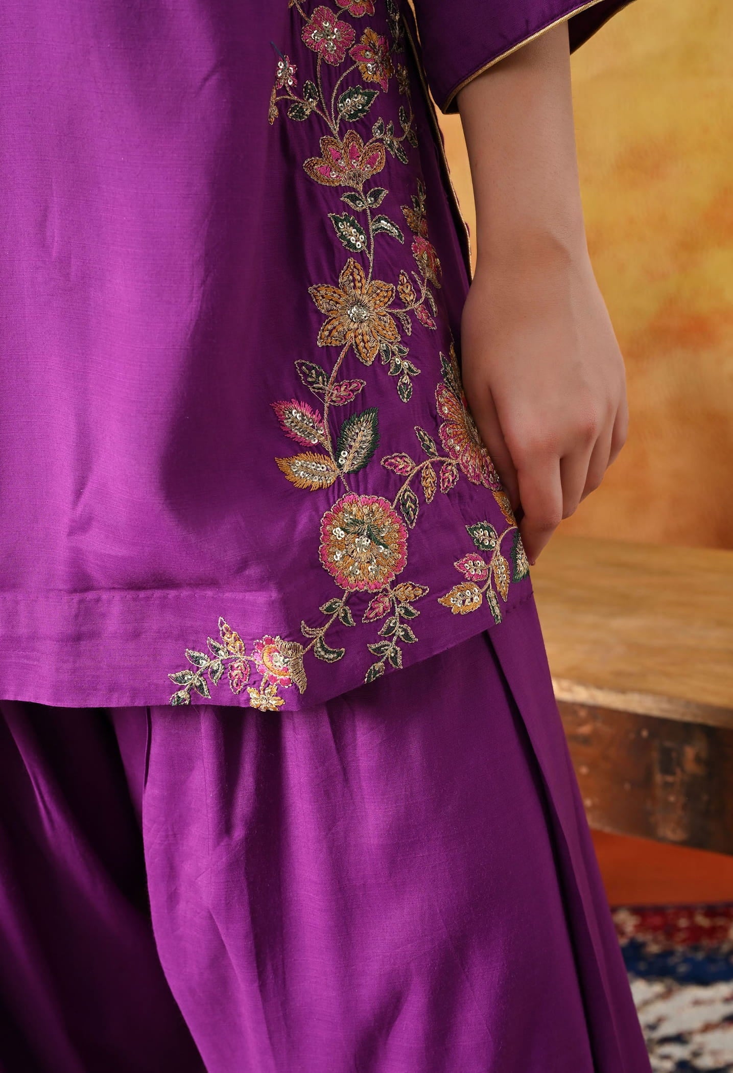 Elegant purple kurta set in cotton silk with thread, zardozi, and sequin work, paired with a graceful farshi salwar and net dupatta