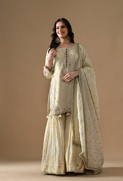 Golden Gharara Set with Dabka, Pearl, Sequin, and Thread embroidery.