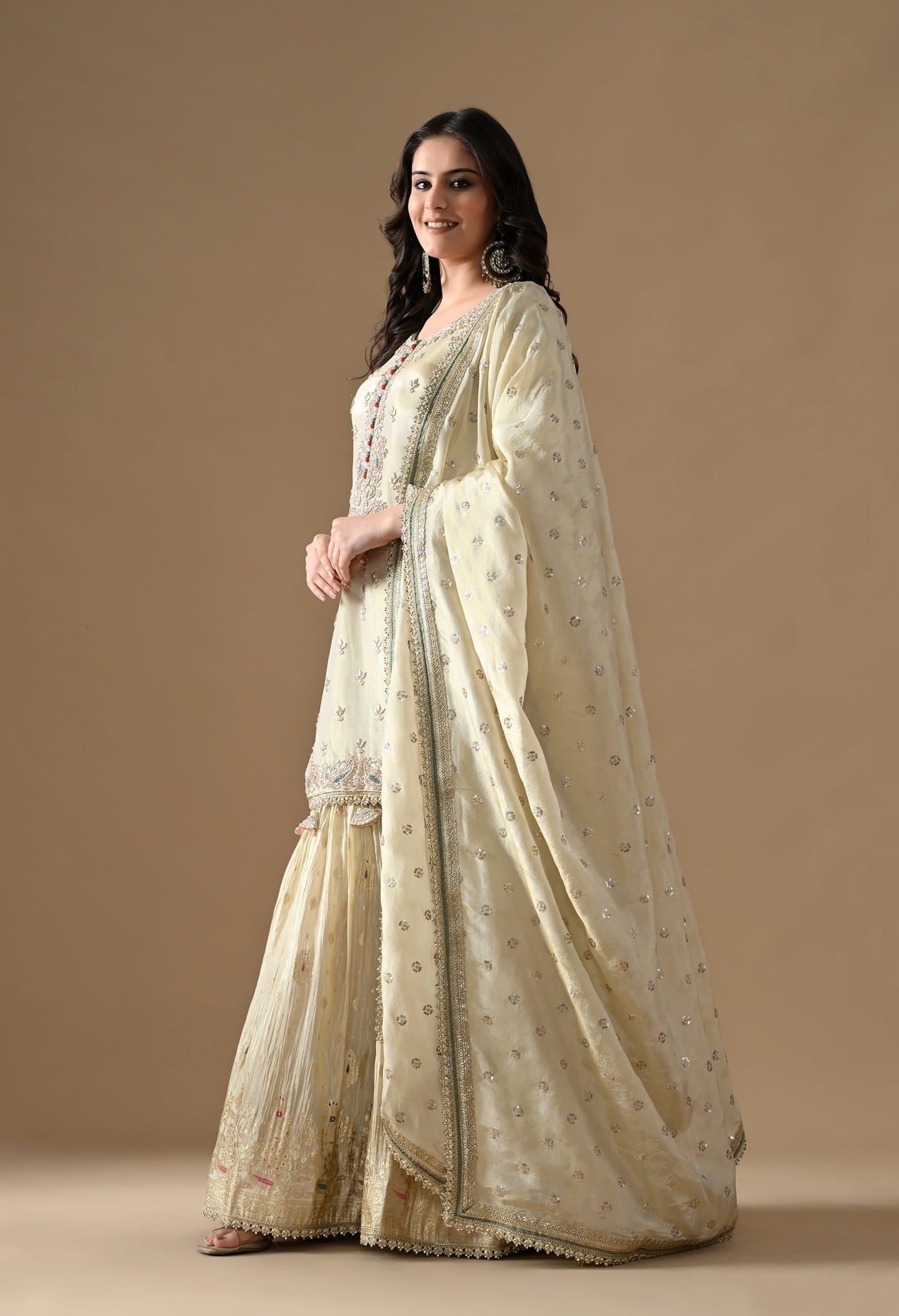 Golden Gharara Set with Dabka, Pearl, Sequin, and Thread embroidery.