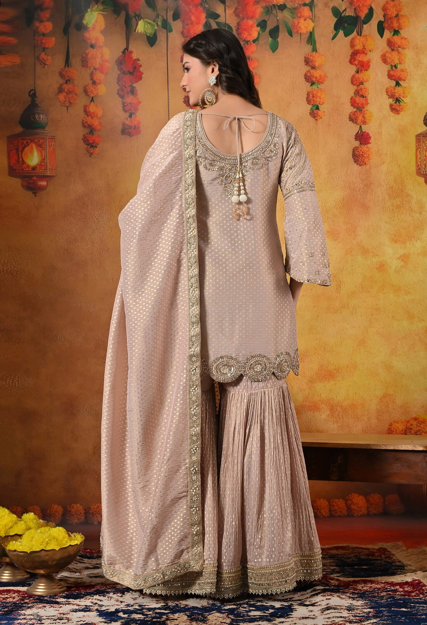 Golden Peach Gharara Set with Dabka, Zardozi, Pearl, and Sequin work.