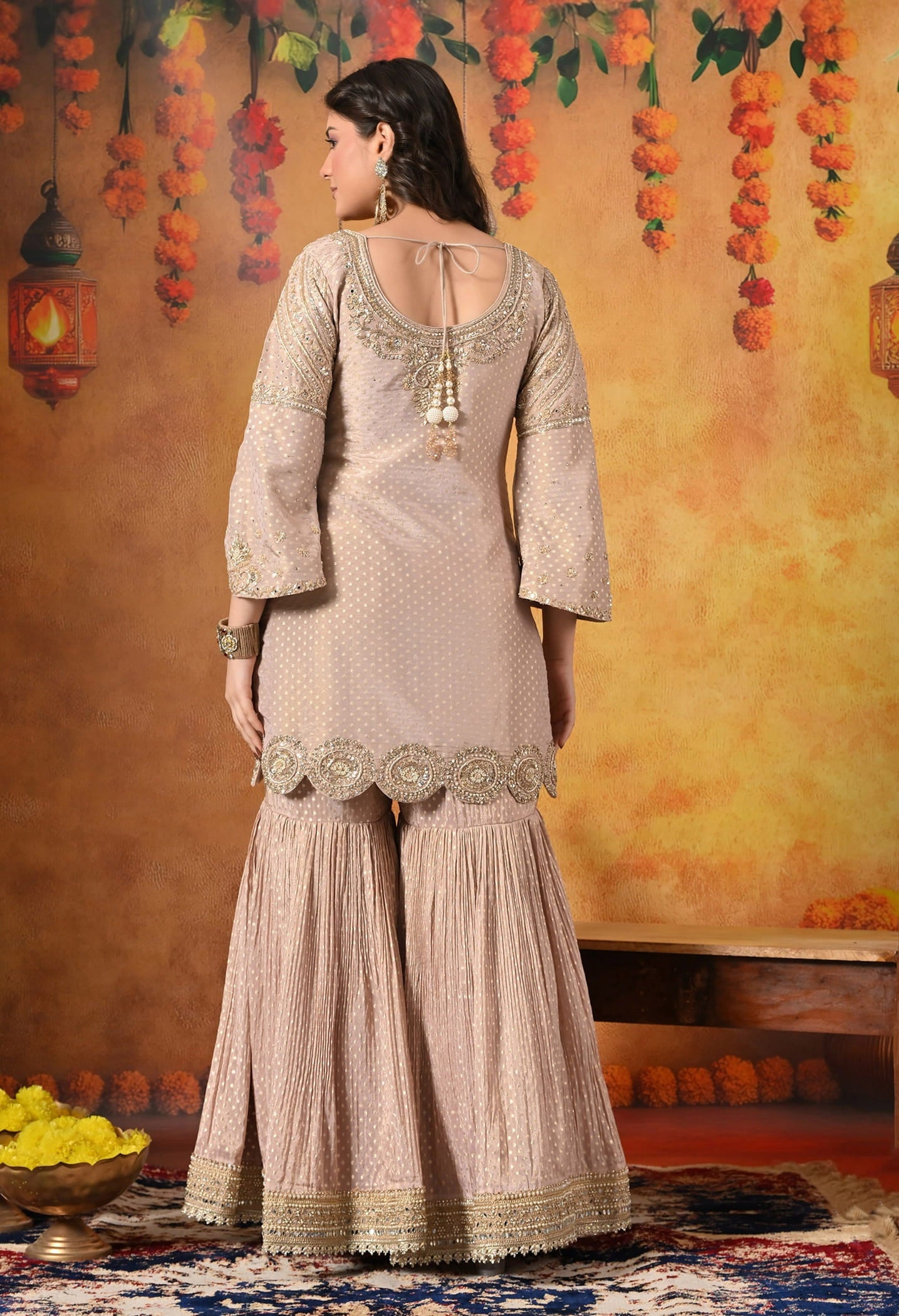 Golden Peach Gharara Set with Dabka, Zardozi, Pearl, and Sequin work.