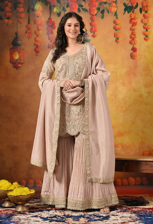 Golden Peach Gharara Set with Dabka, Zardozi, Pearl, and Sequin work.