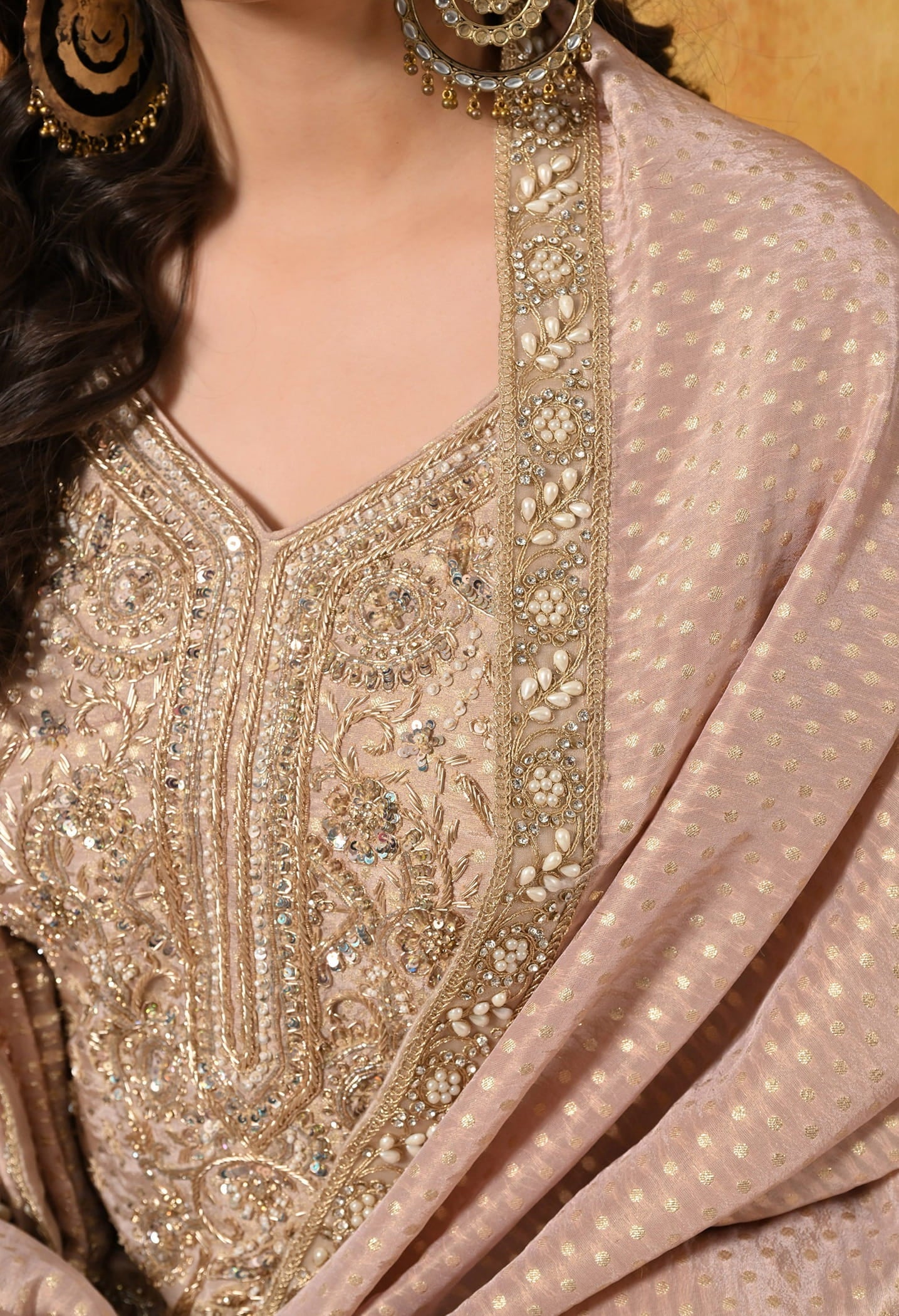 Golden Peach Gharara Set with Dabka, Zardozi, Pearl, and Sequin work.