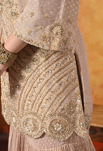 Golden Peach Gharara Set with Dabka, Zardozi, Pearl, and Sequin work.