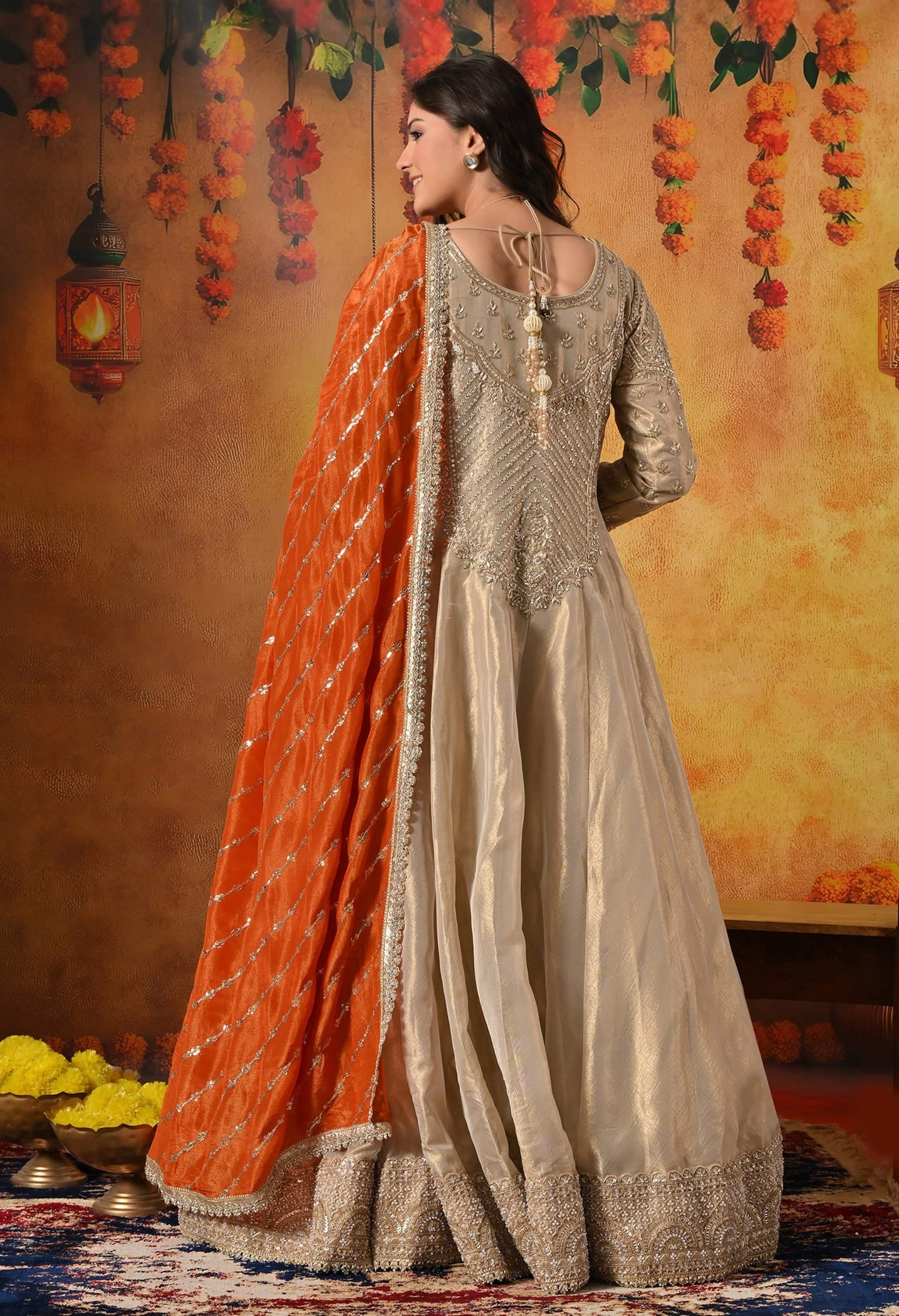 Golden Anarkali Set with Dabka, Zardozi, Pearl, and Sequin Embroidery.