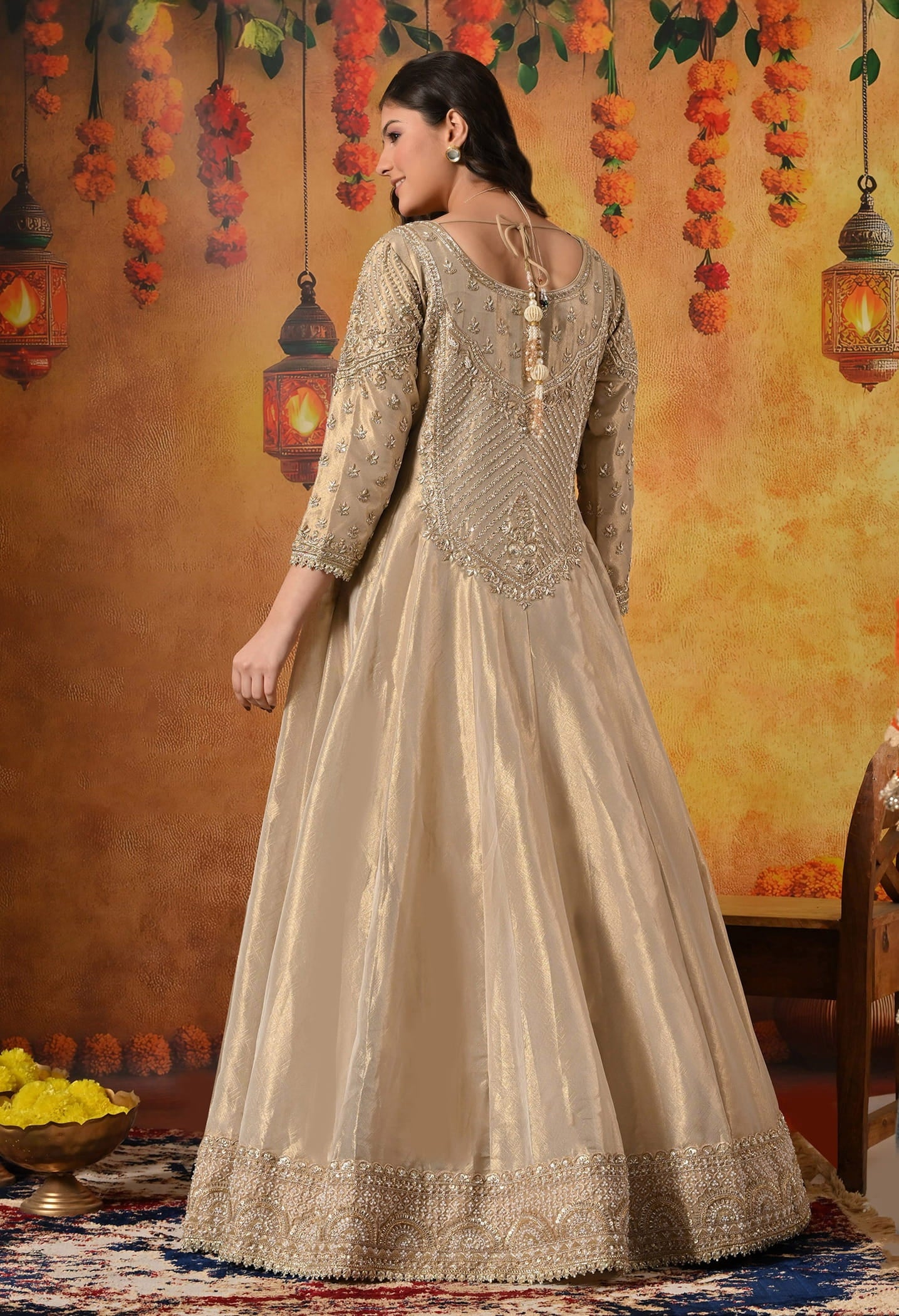 Golden Anarkali Set with Dabka, Zardozi, Pearl, and Sequin Embroidery.