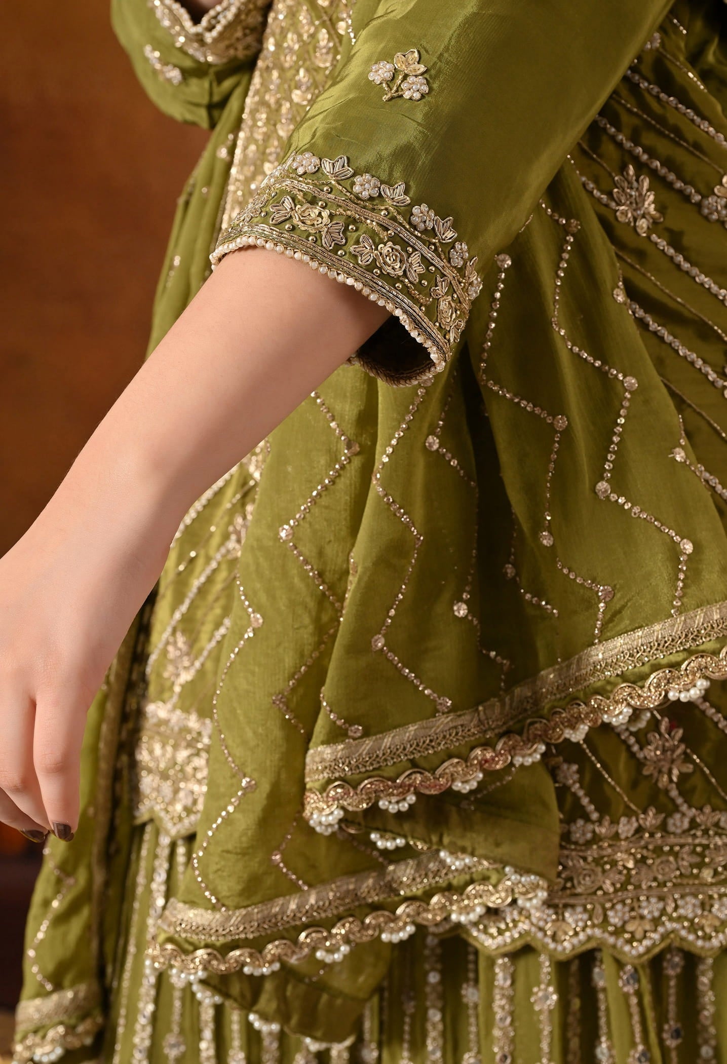 Green Gharara Set crafted with Dabka, Pearl, Zardozi, and Cutdana work.