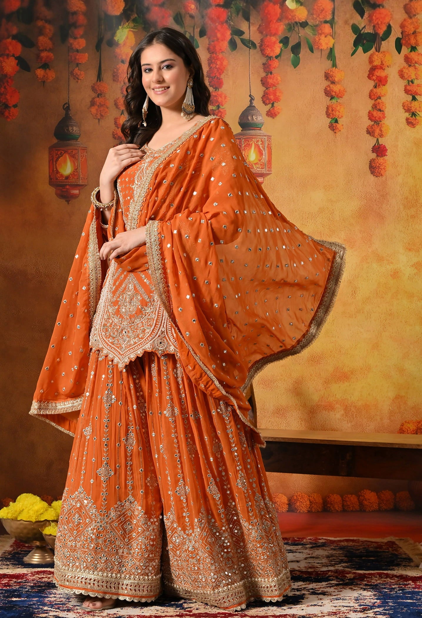 Orange Gharara Set crafted with Zardozi, Sequin, Mirror, and Pearl work.