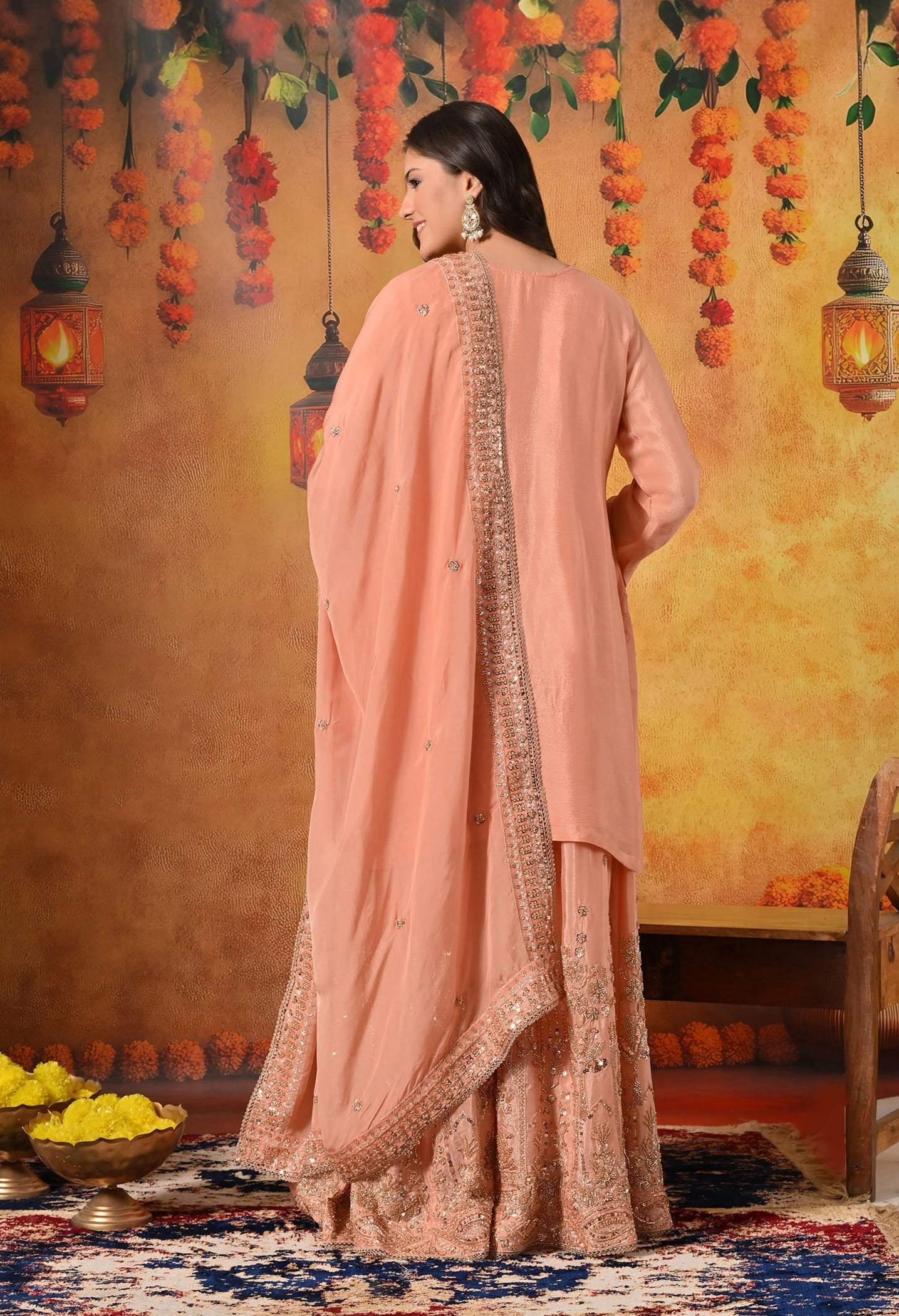 Dark Peach Sharara Set with Pearl, Zardozi, Sequin, and Cutdana Embroidery.