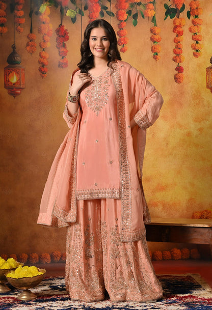 Dark Peach Sharara Set with Pearl, Zardozi, Sequin, and Cutdana Embroidery.