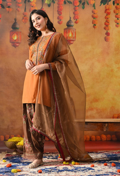 Orange Silk Kurta Set with intricate thread, sequin, and zardozi work, paired with a brown farshi salwar and net dupatta