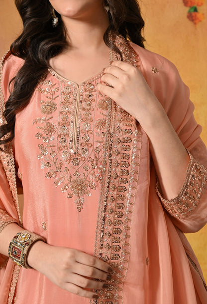 Dark Peach Sharara Set with Pearl, Zardozi, Sequin, and Cutdana Embroidery.
