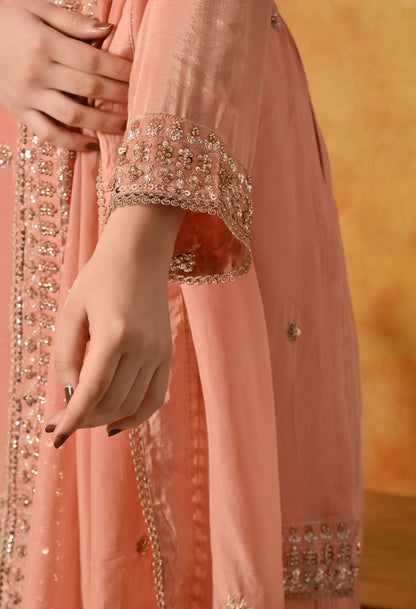 Dark Peach Sharara Set with Pearl, Zardozi, Sequin, and Cutdana Embroidery.