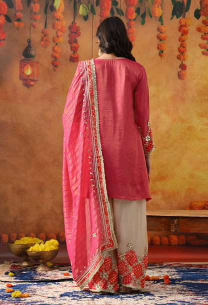 Pink Tissue Silk Kurta Set with intricate gotta and zardozi work, paired with a tissue organza dupatta and golden farshi salwar.