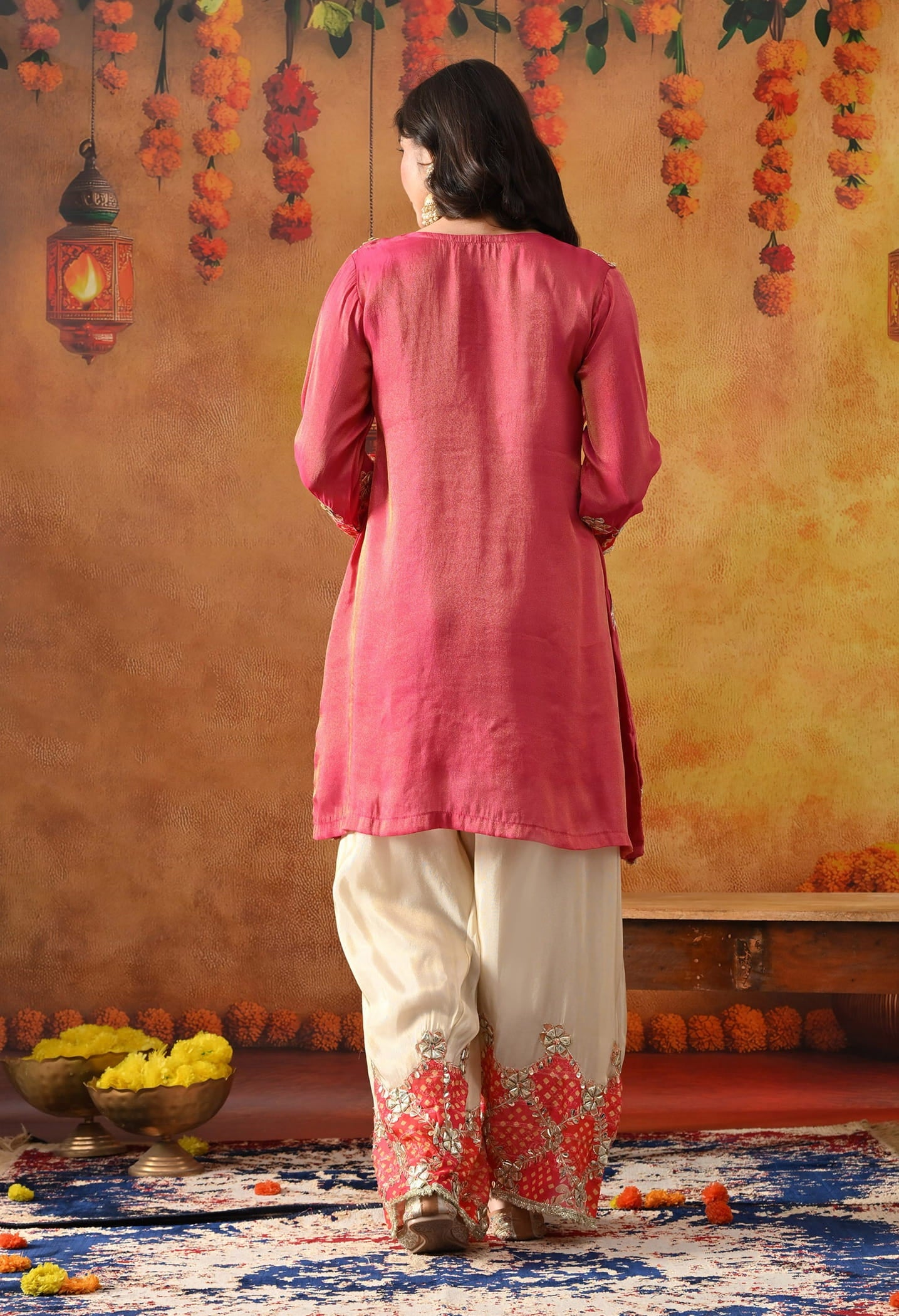 Pink Tissue Silk Kurta Set with intricate gotta and zardozi work, paired with a tissue organza dupatta and golden farshi salwar.