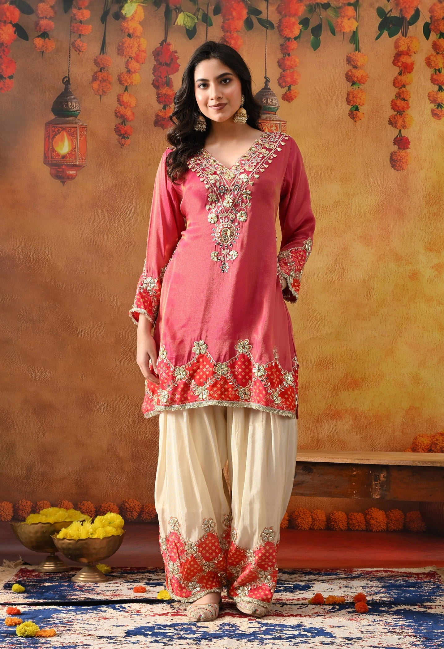Pink Tissue Silk Kurta Set with intricate gotta and zardozi work, paired with a tissue organza dupatta and golden farshi salwar.