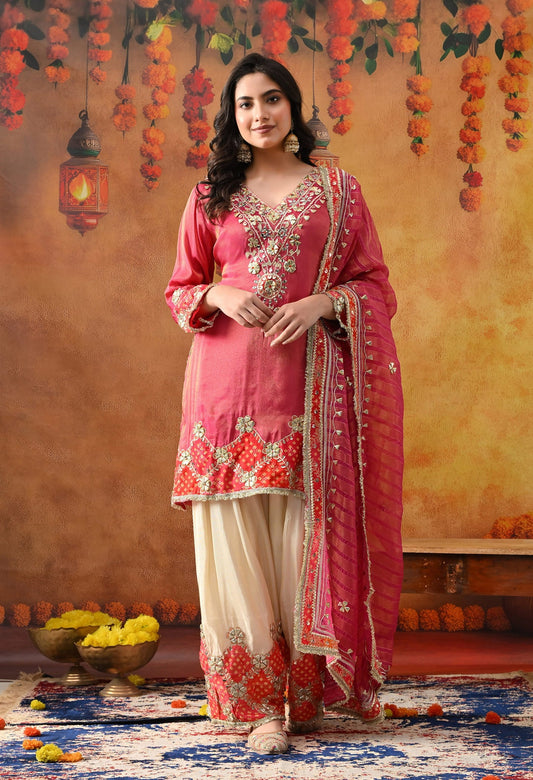Pink Tissue Silk Kurta Set with intricate gotta and zardozi work, paired with a tissue organza dupatta and golden farshi salwar.