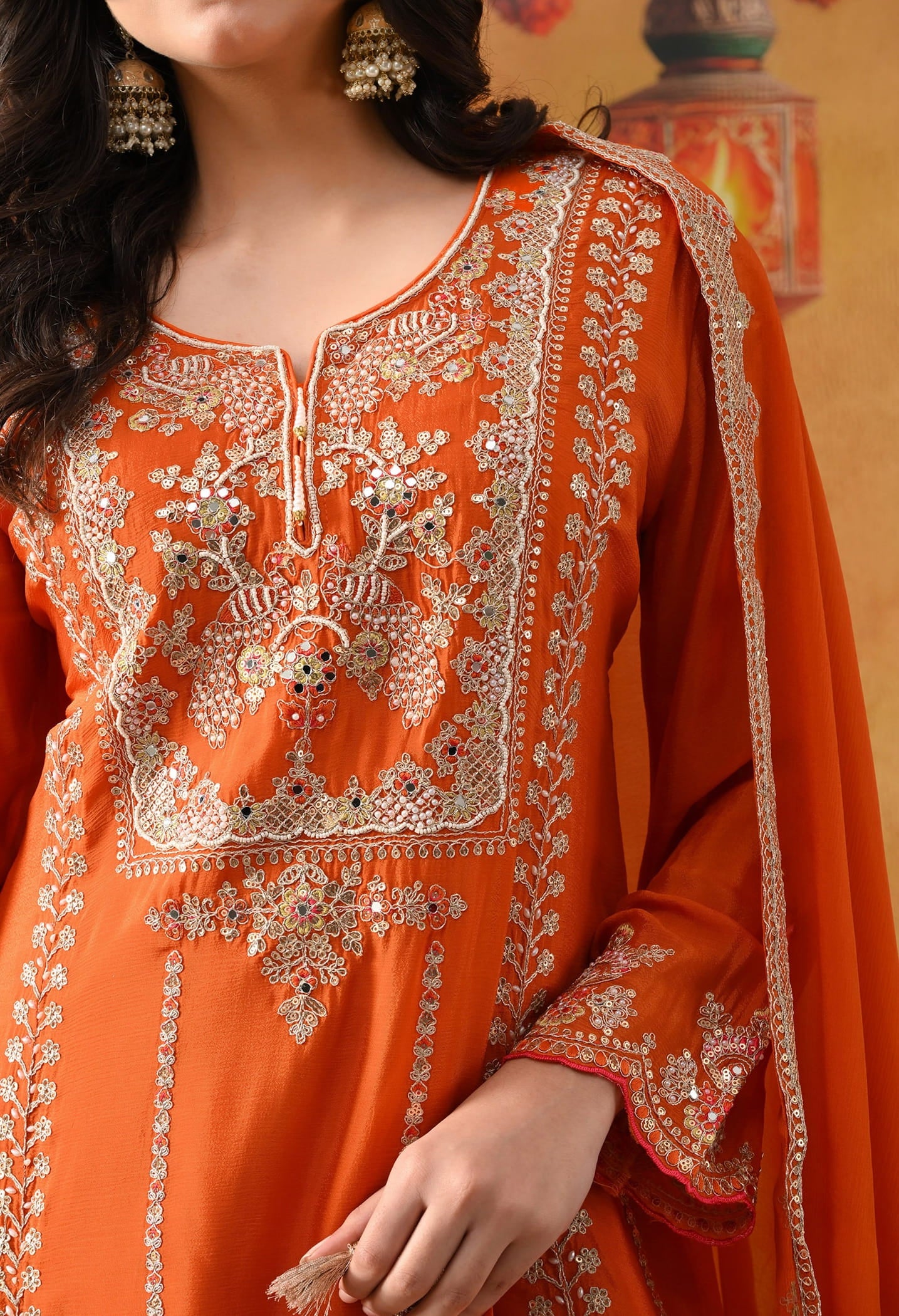 Orange Chinon Sharara Set with intricate zardozi, sequin, and thread work, paired with a matching dupatta