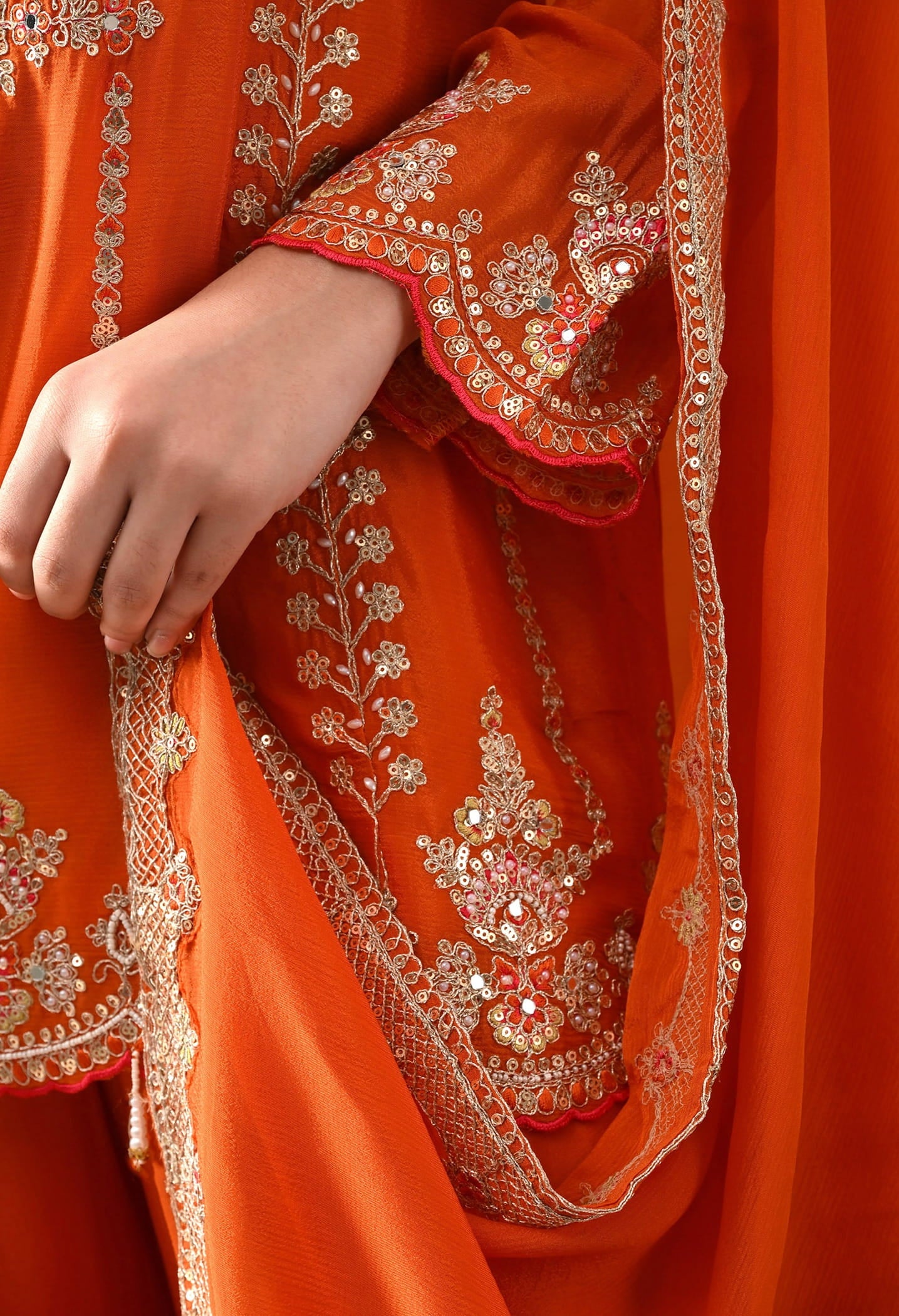 Orange Chinon Sharara Set with intricate zardozi, sequin, and thread work, paired with a matching dupatta