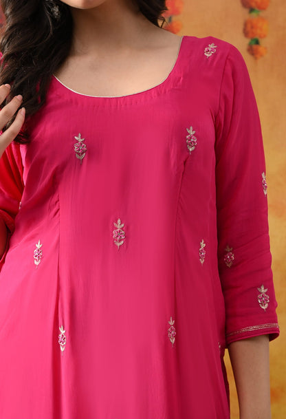 Hot Pink Organza Kurta Set with intricate Zardozi detailing, paired with a matching dupatta and straight pants.