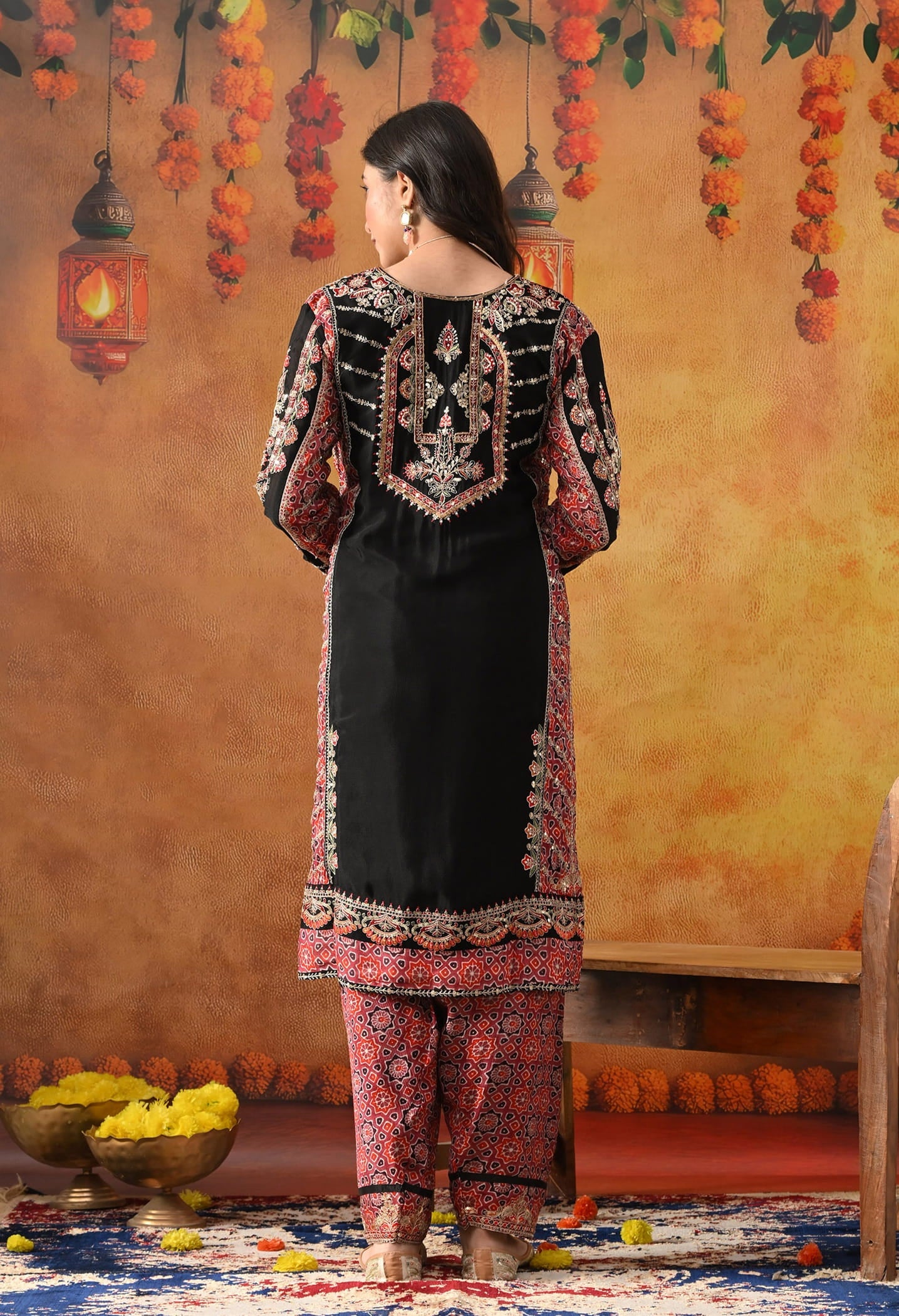 Black Chinon Kurta Set with intricate zardozi, thread, pearl, and sequin work, paired with a pink printed dupatta and matching salwar
