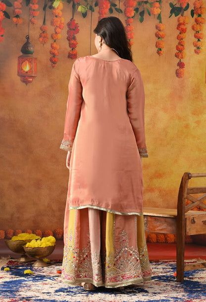Creamy Peach Tissue Crepe Sharara Set with intricate gotta, zardozi, applique, and thread work, paired with a multicolour sharara and matching dupatta