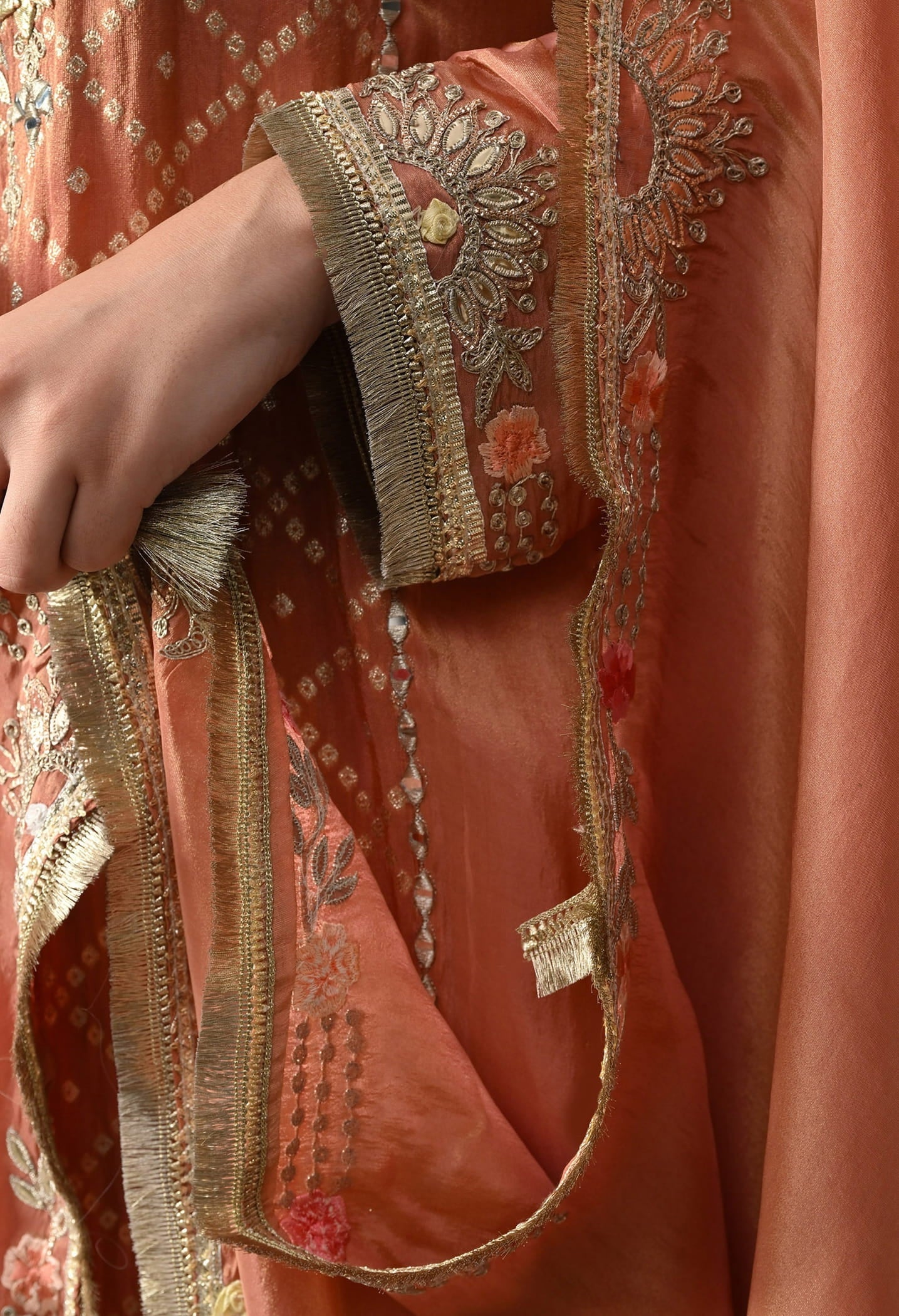 Creamy Peach Tissue Crepe Sharara Set with intricate gotta, zardozi, applique, and thread work, paired with a multicolour sharara and matching dupatta