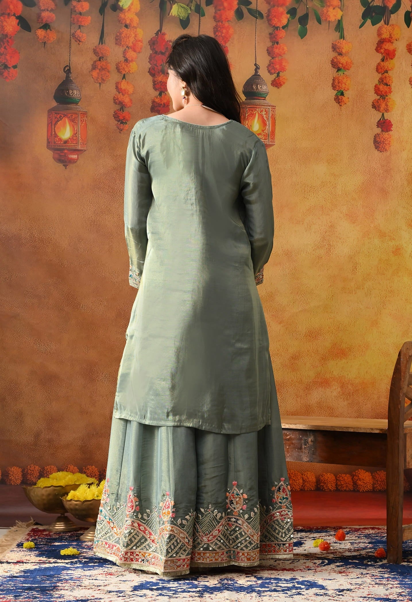 Mint Green Tissue Crepe Sharara Set with intricate gotta, zardozi, applique, thread, and mirror work, paired with a pink and green dupatta