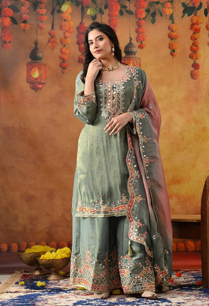 Mint Green Tissue Crepe Sharara Set with intricate gotta, zardozi, applique, thread, and mirror work, paired with a pink and green dupatta