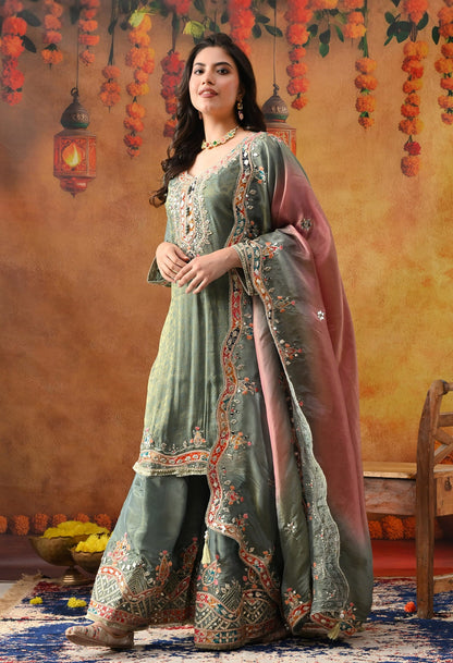 Mint Green Tissue Crepe Sharara Set with intricate gotta, zardozi, applique, thread, and mirror work, paired with a pink and green dupatta
