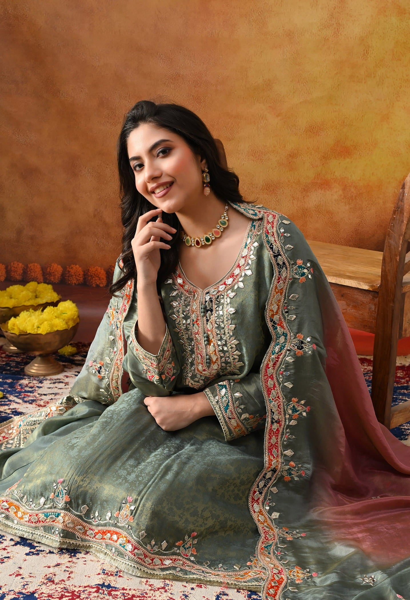 Mint Green Tissue Crepe Sharara Set with intricate gotta, zardozi, applique, thread, and mirror work, paired with a pink and green dupatta