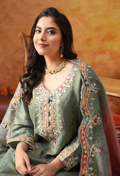 Mint Green Tissue Crepe Sharara Set with intricate gotta, zardozi, applique, thread, and mirror work, paired with a pink and green dupatta