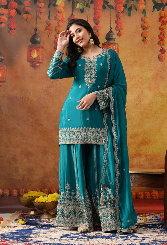 Dark Bluish Green Chinon Sharara Set with intricate zardozi, dabka, crystal, and mirror work, paired with a matching dupatta