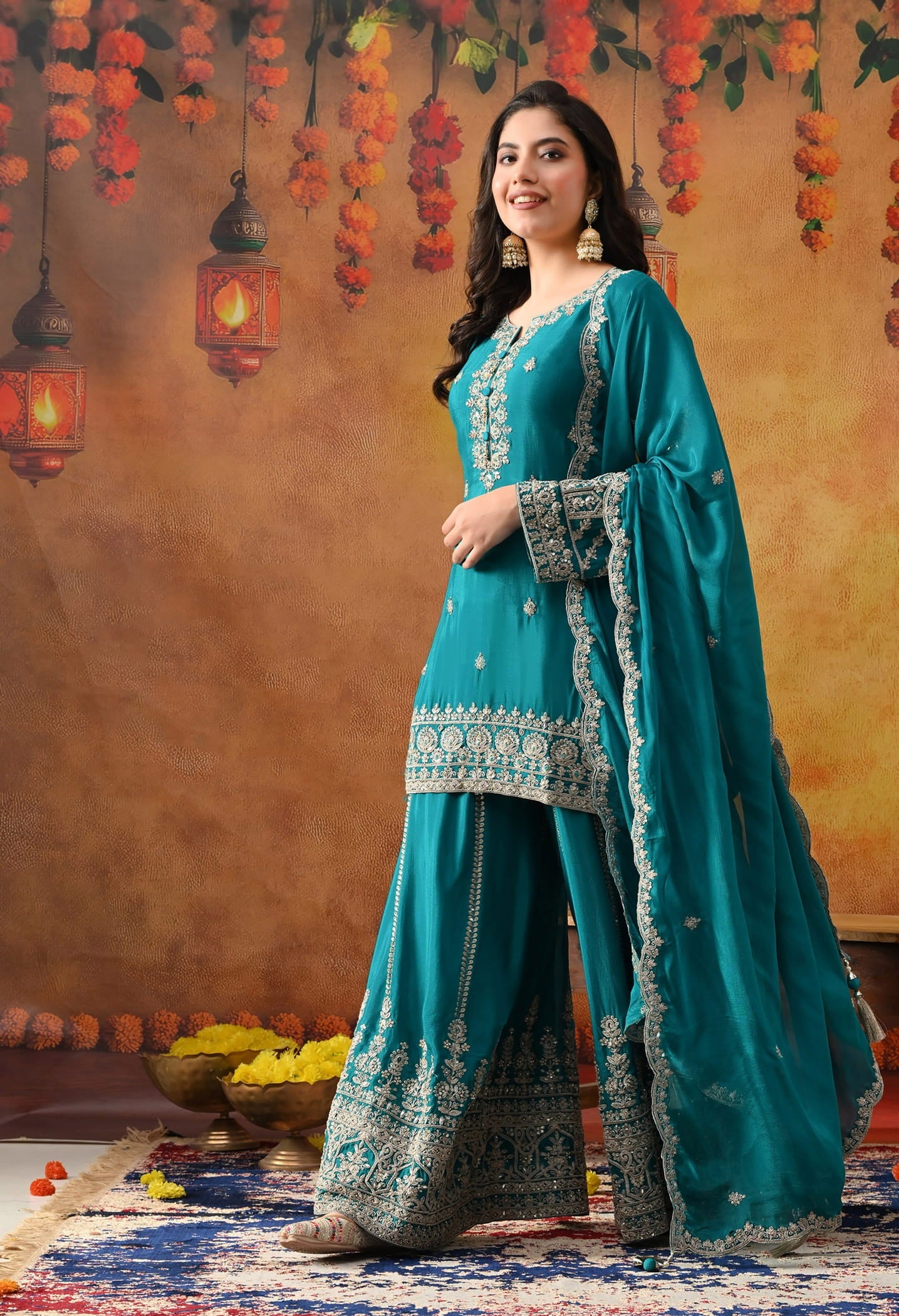 Dark Bluish Green Chinon Sharara Set with intricate zardozi, dabka, crystal, and mirror work, paired with a matching dupatta