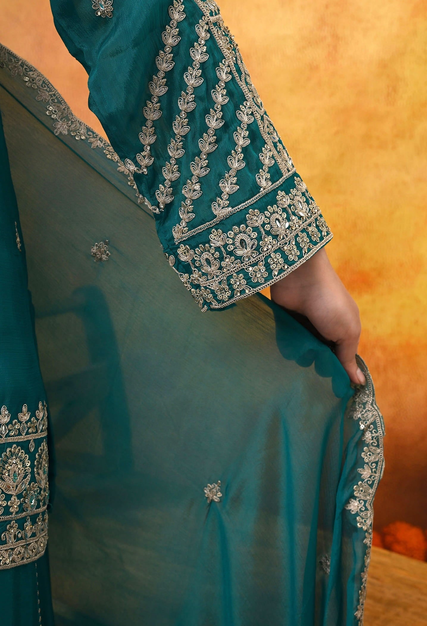 Dark Bluish Green Chinon Sharara Set with intricate zardozi, dabka, crystal, and mirror work, paired with a matching dupatta