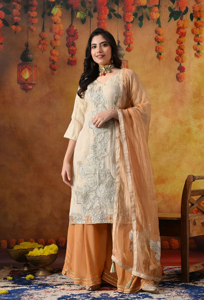 Golden Sharara Set in crust tissue organza with intricate gotta, crystal, and applique work, paired with a golden brown sharara and dupatta