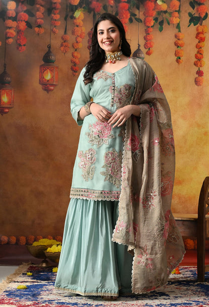 Pistachio Green Gharara Set in crust tissue with intricate gotta, applique, and zardozi work, paired with a contrasting brown dupatta
