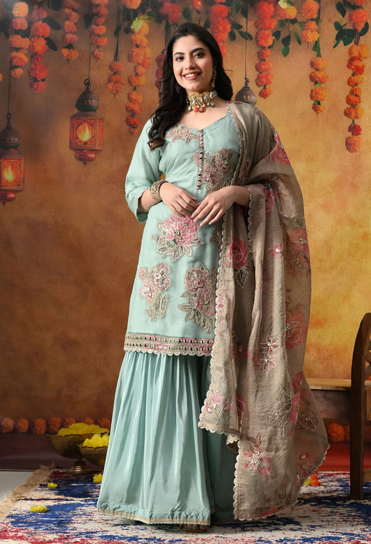 Pistachio Green Gharara Set in crust tissue with intricate gotta, applique, and zardozi work, paired with a contrasting brown dupatta