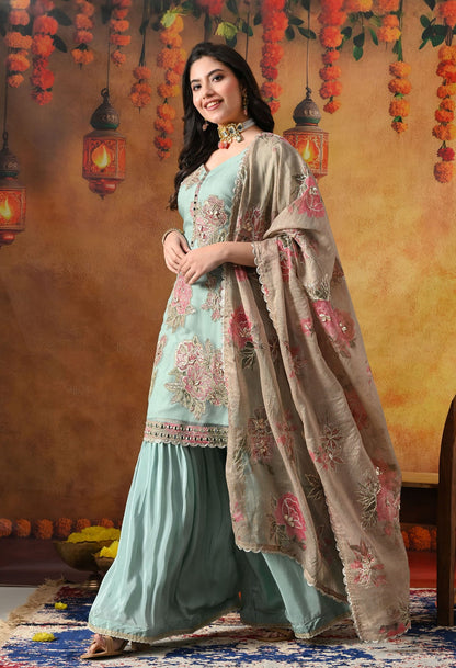 Pistachio Green Gharara Set in crust tissue with intricate gotta, applique, and zardozi work, paired with a contrasting brown dupatta