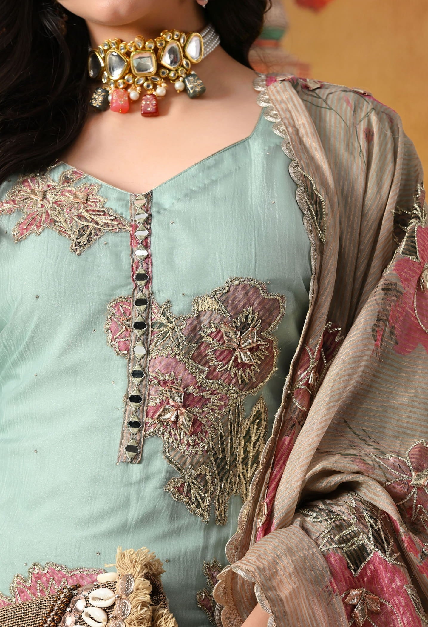 Pistachio Green Gharara Set in crust tissue with intricate gotta, applique, and zardozi work, paired with a contrasting brown dupatta
